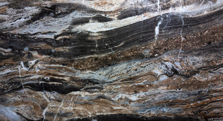 Photo of granite stone texture. Expensive kitchen countertop made of natural granite. Granite background.
