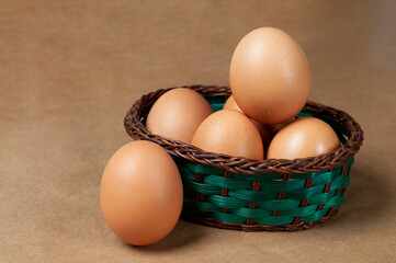 brown eggs in a basket