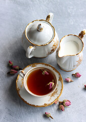 Obraz na płótnie Canvas Still life with cup of tea. Small ceramic cup close up photo. 