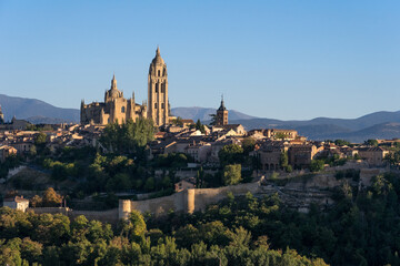 Fototapeta na wymiar View of the city and St Mary Cathedral of segovia at sunset, listed world Heritage centre by UNESCO