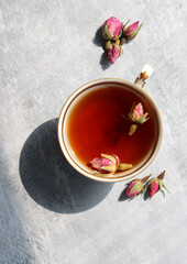 Still life with cup of tea. Small ceramic cup close up photo. 