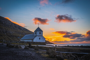 Stunning autumn view of medieval Olaf's Church in Kirkjubour village. Great sunrise in Faroe...