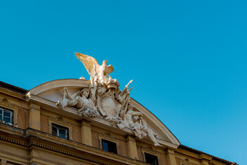 Obraz premium Rome, Italy - October 01 2019: Close up of the roof of the Italian Cassa Depositi e prestiti in Rome, with statues