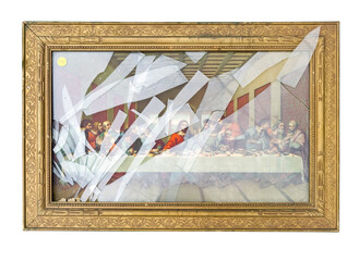 Framed thrift store LAST SUPPER print with broken glass. Isolated.