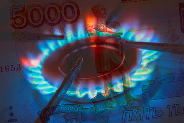 Pay for Russian gas in roubles concept. Russia Sanctions and Ukraine war concept. Blue gas burning...