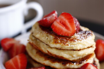 Closeup pancakes with strawberries food sweet breakfast dessert tasty pastry bakery red berry cup