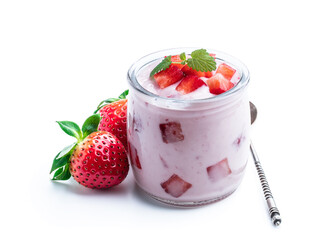 Homemade strawberry yogurt with fresh sliced berries isolated on white