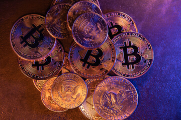 Half Dollar and Bitcoin coins piling up, trading volume Cryptocurrency concept