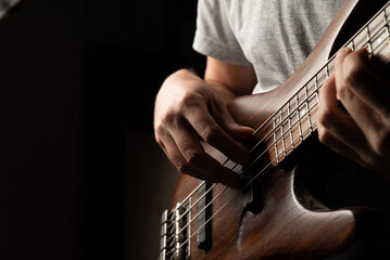 playing the bass, bass and guitar lessons