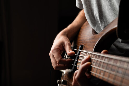 playing the bass, bass and guitar lessons - Powered by Adobe