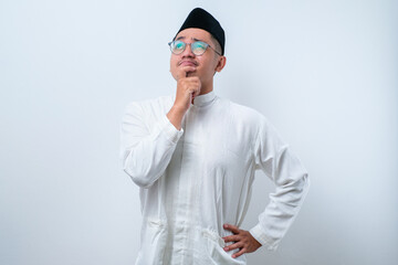 Asian muslim man doing thinking gestire, looking for idea