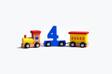Very colorful toy wooden train with the number four. Love and happiness birthday celebration, performance illustration, online educational toy. early learning