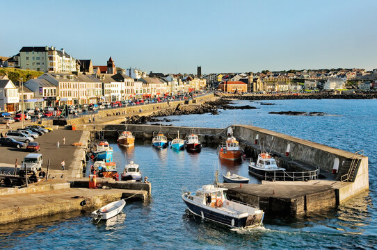 Portstewart fishing boat harbour and main street seafront, County Derry. 3 miles from Coleraine and Portrush, Northern Ireland.