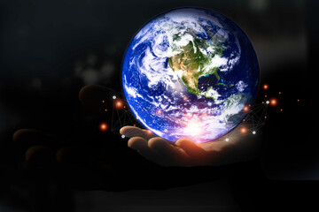 Fototapeta na wymiar Hand holding circle network communication technology for global.Data in the global computer social.telecommunication,earth cryptocurrency.Elements of this image furnished by NASA.
