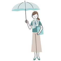 日傘、アームカバー、ストールを身に着け紫外線対策をする女性