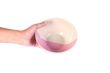 Hand holding Vintage porcelain crockery isolated on white background