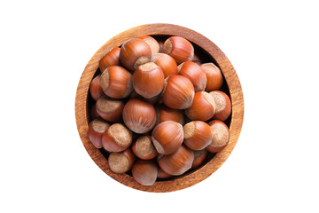 shelled forest nuts in wooden bowl isolated on white background. Vegan food, top view.