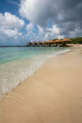 Golden beaches and turquoise waters of Aruba on the shores of Flamingo Island.