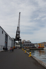 Fototapeta na wymiar Crane in Wellington harbour docks, New Zealand.