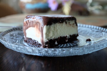 Dairy free ice cream in a container, selective focus. Pieces of ice cream cake with vanilla and cocoa. It is called "Dondurma" or "Dondurma Sandvic" in Turkish. Summer food.