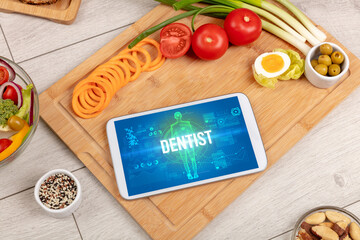 Tablet Pc with fruits, medical concept