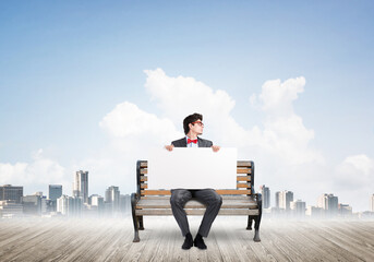 businessman with an empty banner