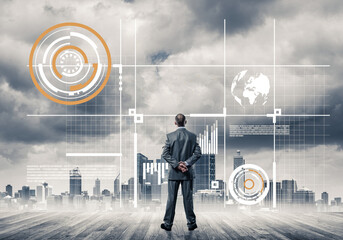 Pensive businessman looking at user interface against modern city background