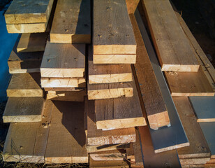  stack of cut wooden boards