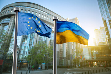 Flags of Ukraine and European Union in Brussels - obrazy, fototapety, plakaty
