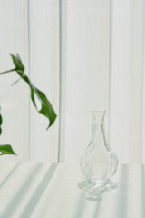 Glassware reflect sunlight shadow effect, Summer still life scene, Transparent glittering glasses of water, Warm light vibe in sunny day.