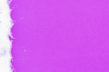 Colored background with white snow around the edges (copy space).