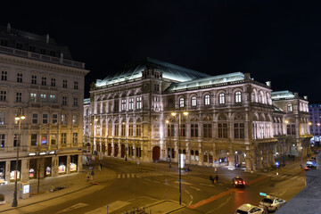 Fototapeta na wymiar Evening view to the Vienna State Opera building in the historic center of Vienna, Austria. January 2022
