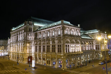 Fototapeta na wymiar Evening view to the Vienna State Opera building in the historic center of Vienna, Austria. January 2022