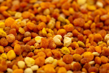 Pollen, beekeeping products close-up as a background. Bee Perga.