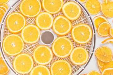 background of fresh and dried orange slices