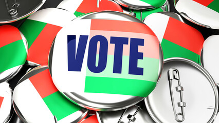 Madagascar and Vote - dozens of pinback buttons with a flag of Madagascar and a word Vote. 3d render symbolizing upcoming Vote in this country., 3d illustration