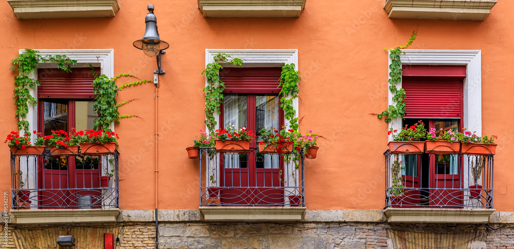 Wall mural Stone house facades in Pamplona Spain, town famous for bull running