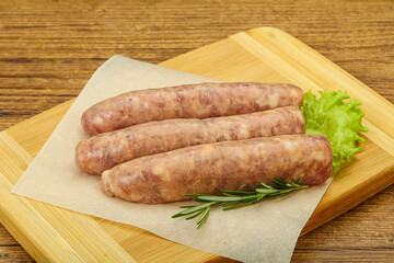 Raw pork meat sausages for grill