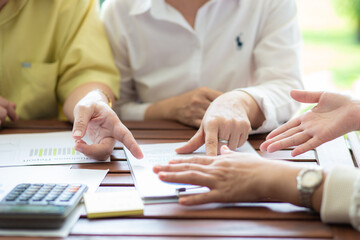 Business man woman hand present business plan with calculator and graph