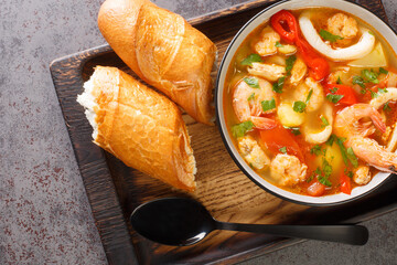 Caldeirada de frutos do mar Portuguese seafood stew with potatoes, peppers, tomatoes and onions...