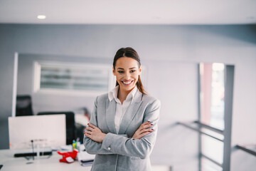 Obraz premium Portrait of successful young businesswoman at office.