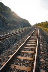 railroad tracks that run along the cliff