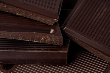 Fototapeta na wymiar Milk chocolate bars stack for background, close up