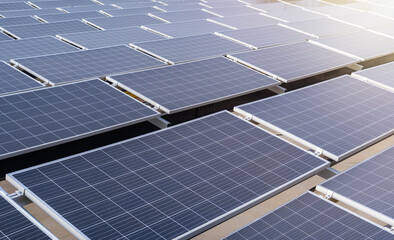 Close up photo of installed photovoltaic solar panels as a background. Clean green and renewable...