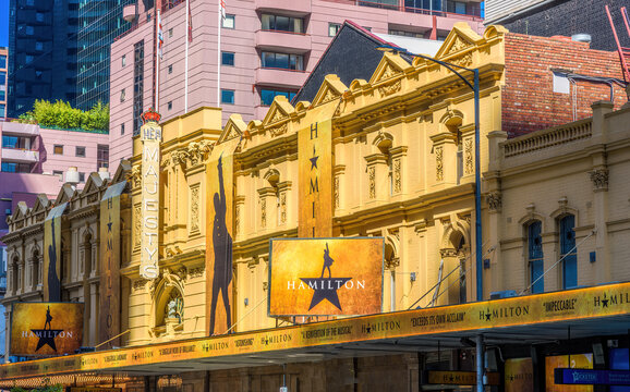 Melbourne, Victoria, Australia, March 26th, 2022: A front view of Her Majesty's Theatre in Melbourne, decorated with the signage of the musical production Hamilton