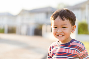 2 years old happy asian boy child showing front teeth with big smile and laughing: Pediatric oral care, toddler talk kid.portrait of asian Korean Japanese Chinese Thai children.environment.kid dental