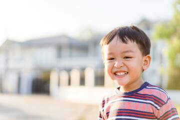 2 years old happy asian boy child showing front teeth with big smile and laughing: Pediatric oral care, toddler talk kid.portrait of asian Korean Japanese Chinese Thai children.environment.kid dental