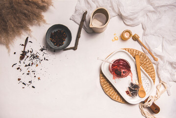 breakfast with red tea and honey with lemon