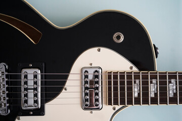 detail photo of an black electric guitar