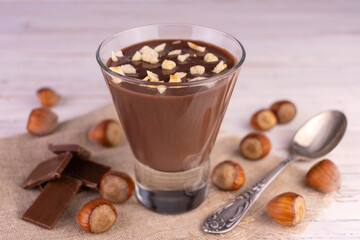 Chocolate mousse with hazelnuts. Close-up.